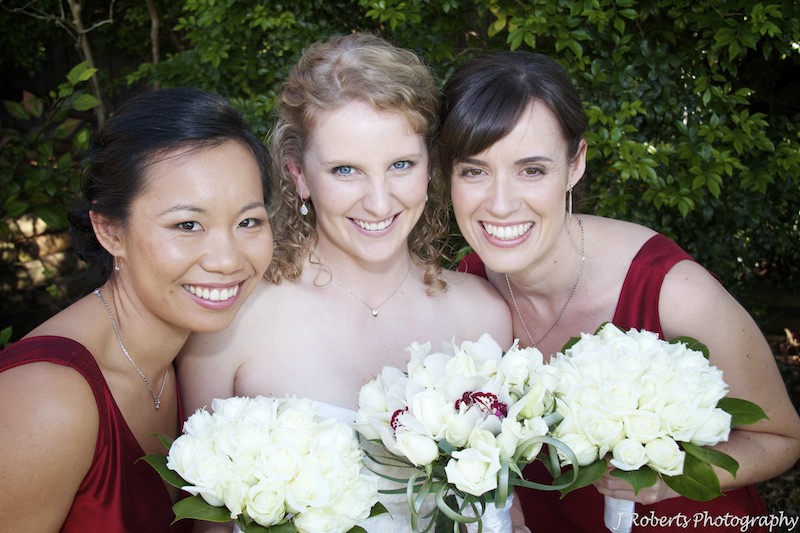 Bride laughing with 2 bridesmaids - wedding photography sydney